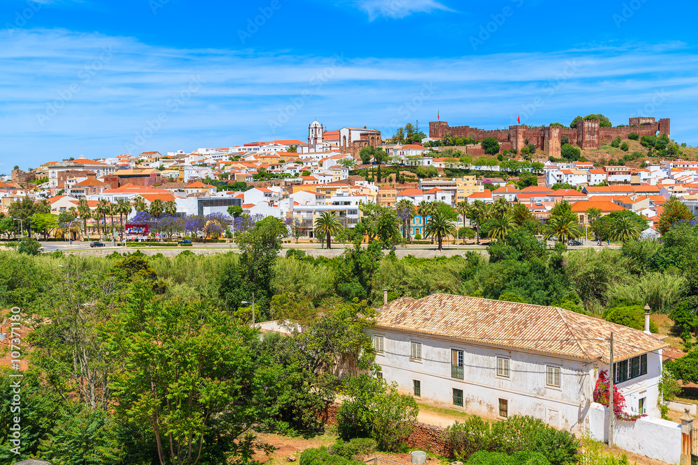 A view of Silves town buildings with famous castle and cathedral, Algarve region, Portugal