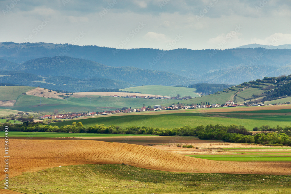 Green spring hills in Slovakia. April sunny countryside