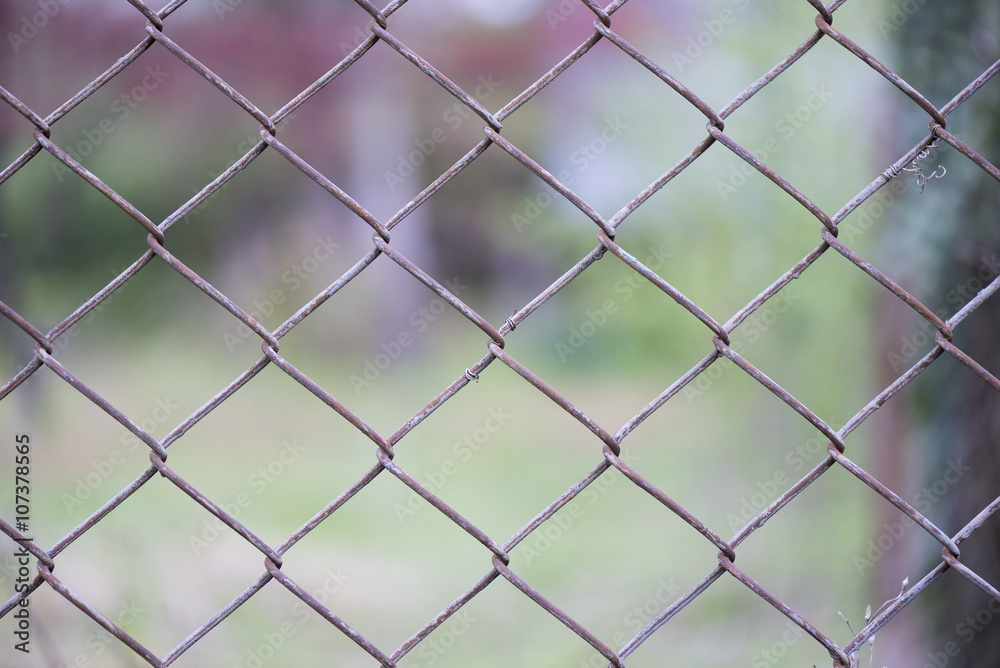 Fototapeta premium rusty metal grid on a black background
