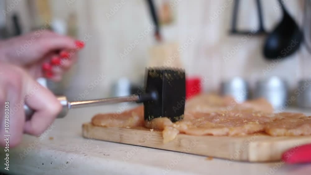 Young woman is cooking in the kitchen Young woman is cooking in the kitchen