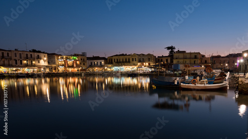 The venetian harbor of Retymno with lots of restaurants at the pier. © Dziurek