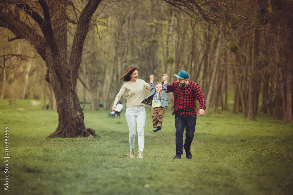 Fototapeta premium Happy family in the park