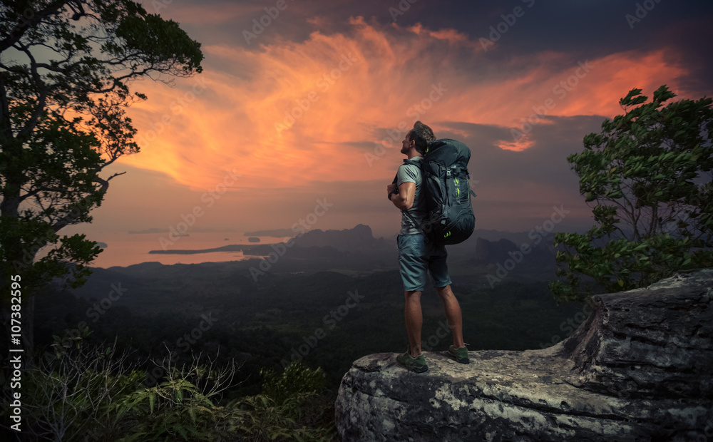 Hiker on top of a mountain Hiker on top of a mountain
