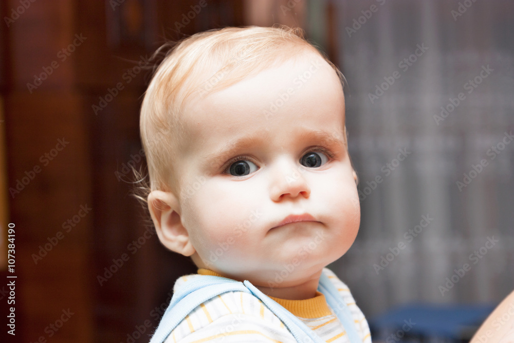 portrait of a serious baby
