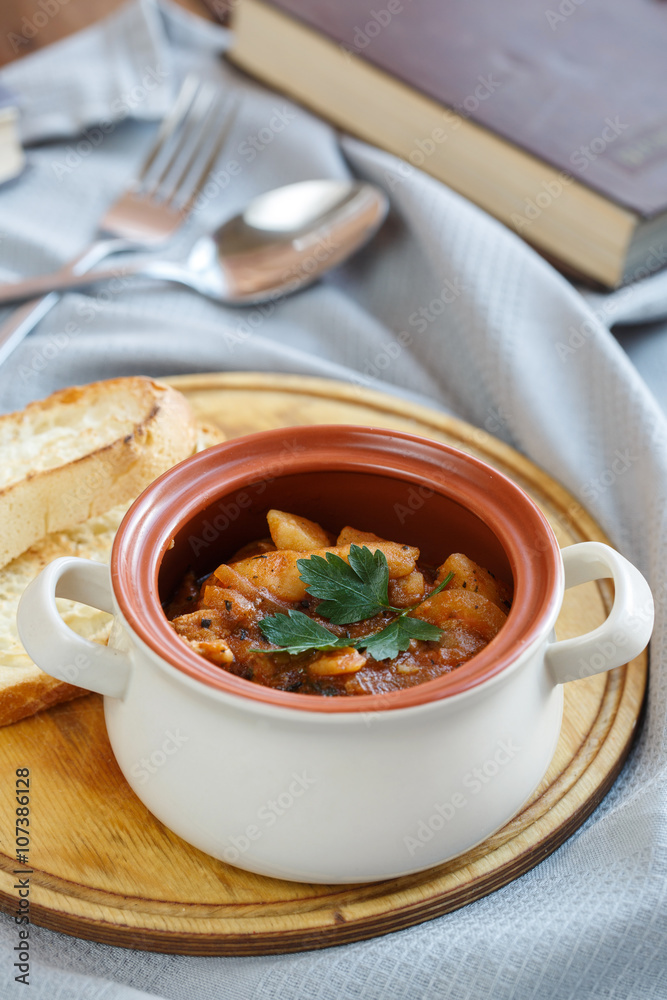 Roast in a pot with meat and vegetables Roast in a pot with meat and vegetables