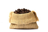roasted coffee beans spilled in burlap sacks over white backgrou