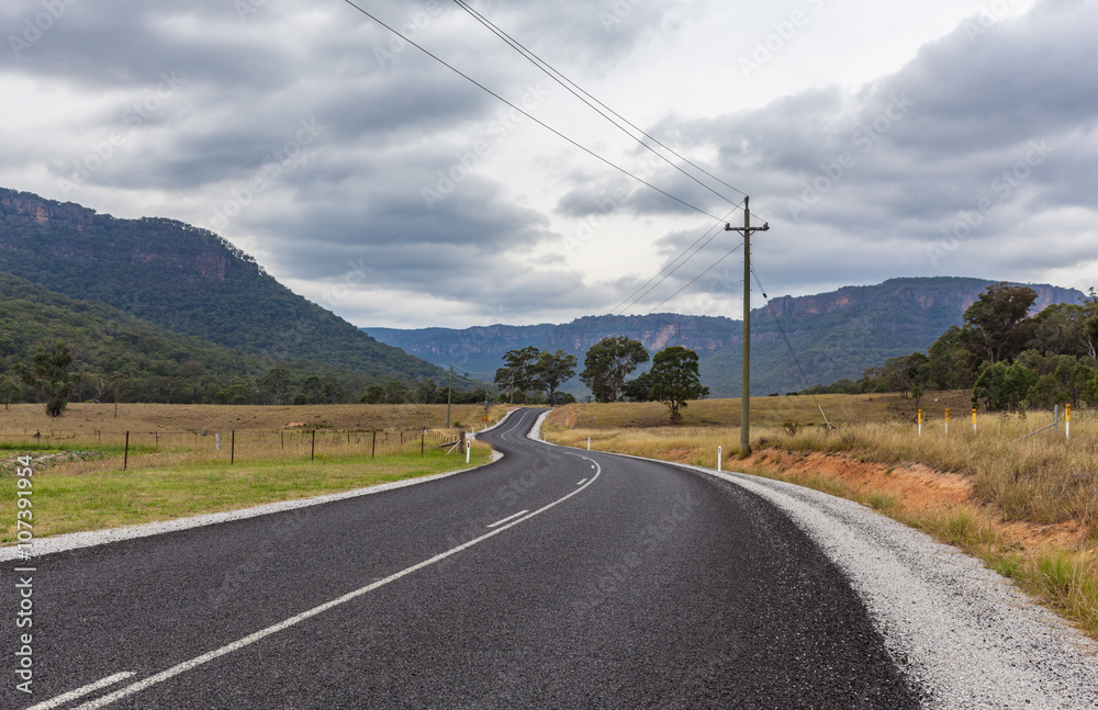 Scenic winding rural road in Wollemi National Park, New South Wales, Australia Scenic winding rural road in Wollemi National Park, New South Wales, Australia