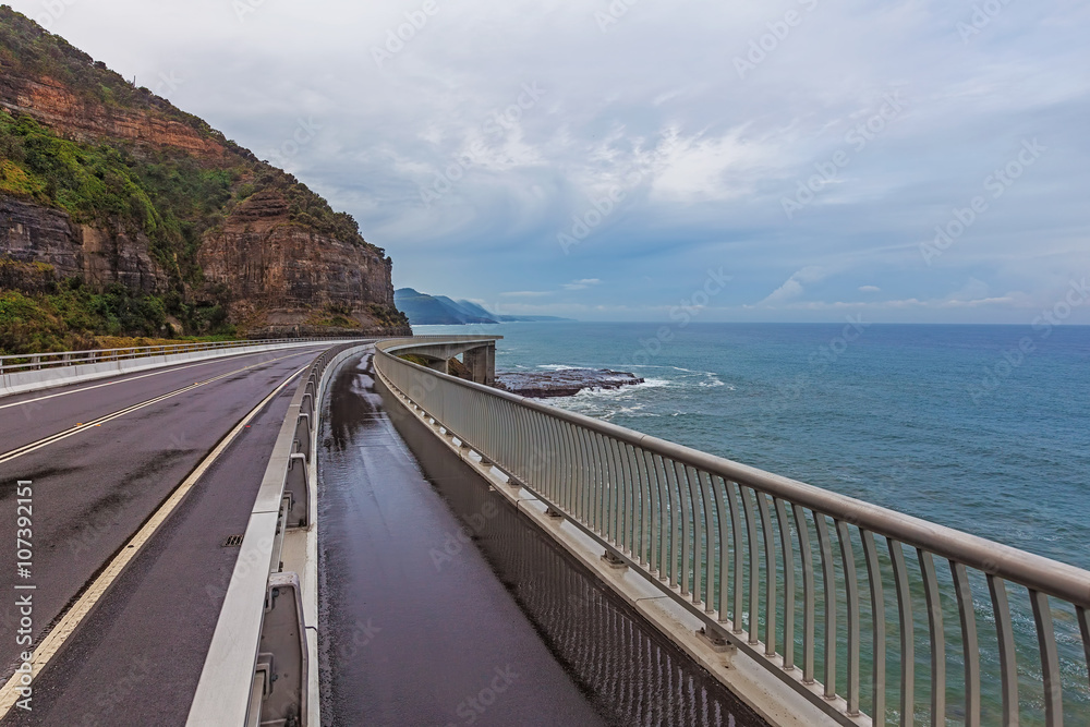 View of the magestic Sea Cliff Bridge and surrounding landscape of Grand Pacific Drive, Sydney, Australia.