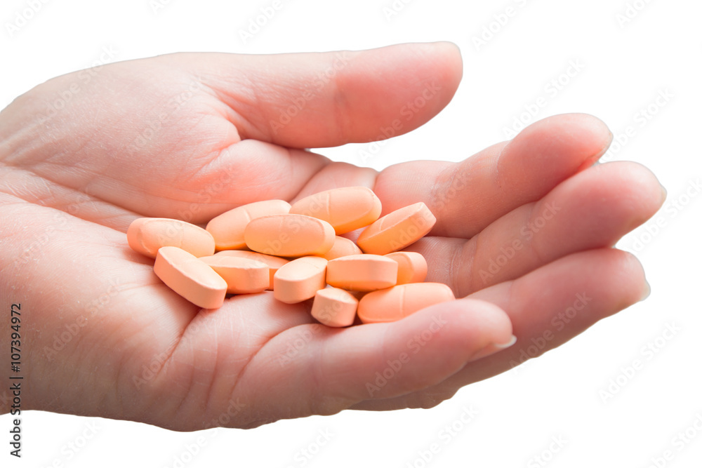 a handful of pills in hand a handful of pills in hand