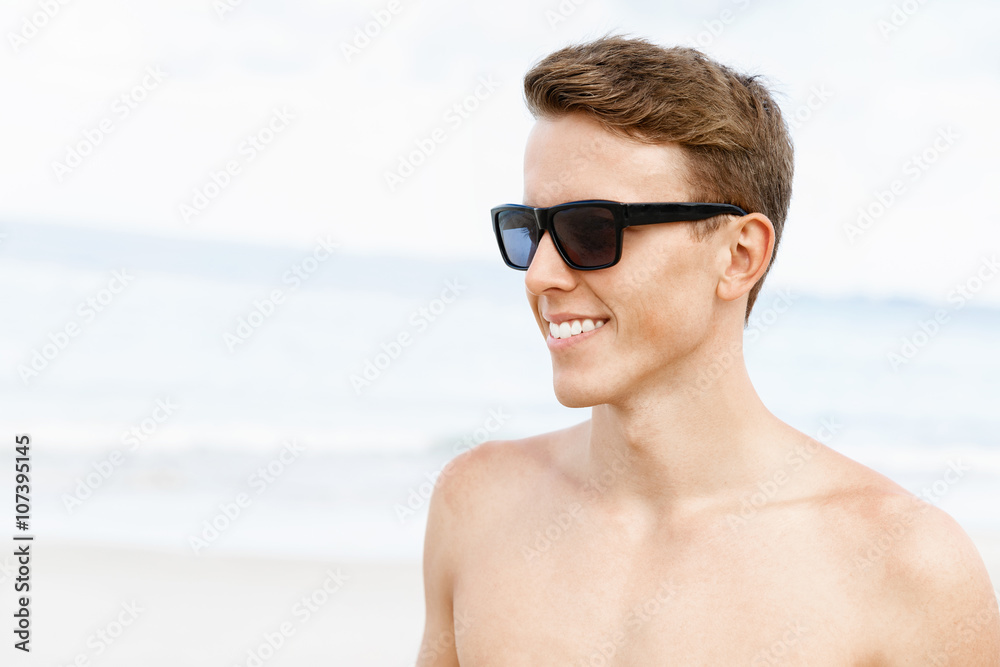 Handsome man posing at beach Handsome man posing at beach