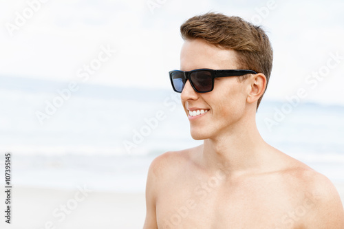Handsome man posing at beach © Sergey Nivens