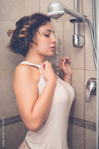 Fotografie Woman taking a shower