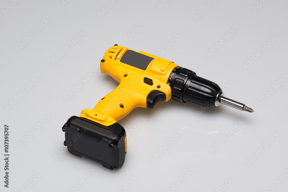 Cordless screwdriver or power drill isolated on a white background Cordless screwdriver or power drill isolated on a white background