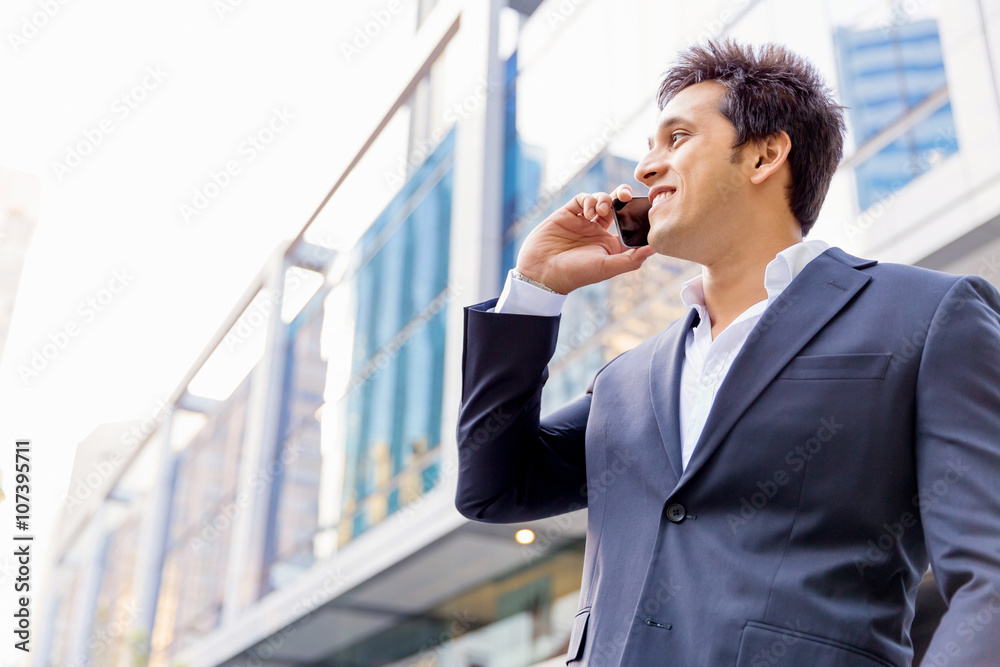 Portrait of confident businessman with mobile phone outdoors Portrait of confident businessman with mobile phone outdoors
