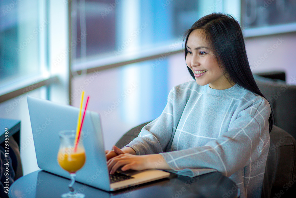 Female using laptop Female using laptop