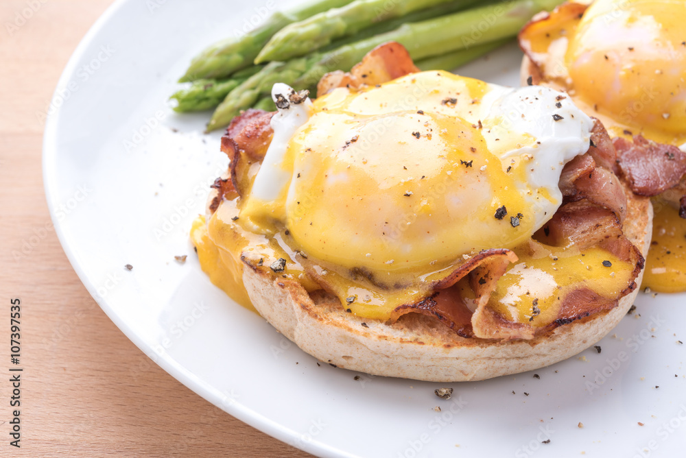 eggs benedict,on the white dish,close up eggs benedict,on the white dish,close up