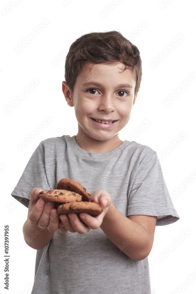 Little boy eating chocolate chip cookie Little boy eating chocolate chip cookie