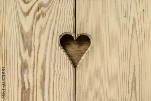 heart in a wooden wall background
