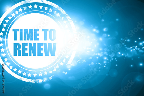 Blue stamp on a glittering background: time to renew