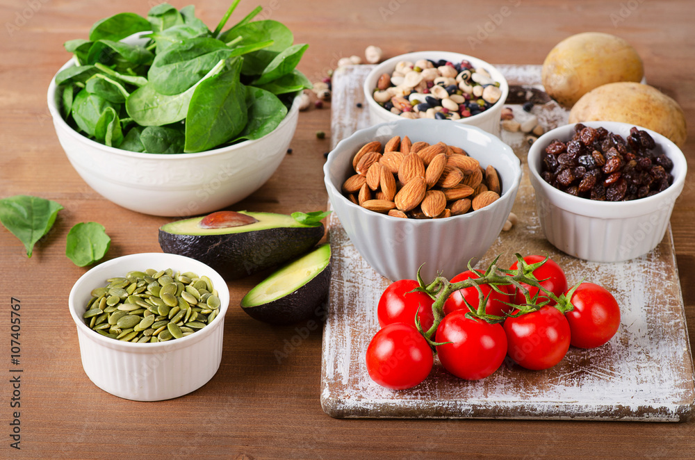 Foods containing potassium on wooden table Foods containing potassium on wooden table