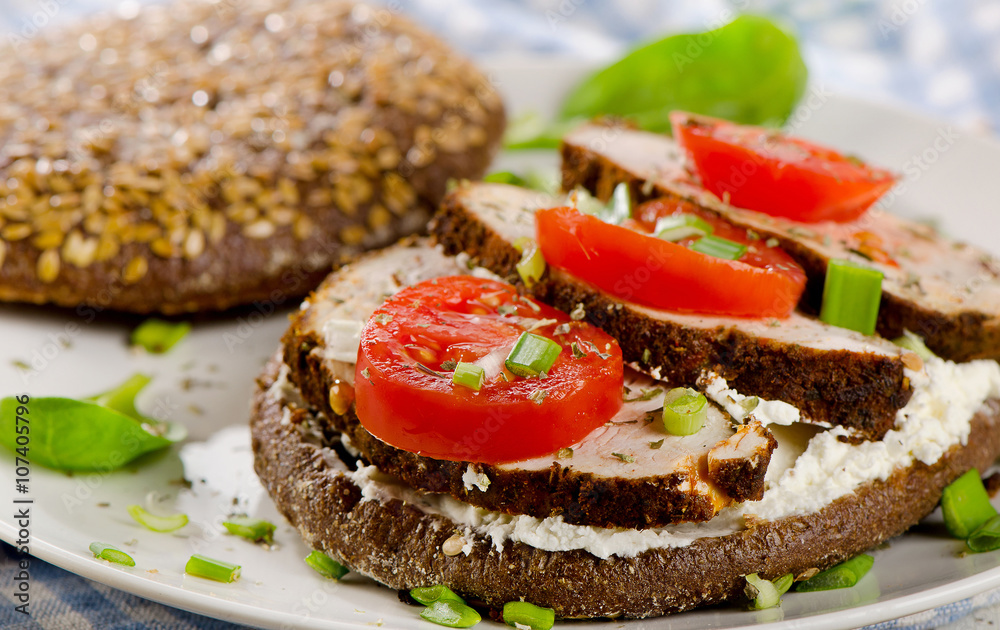 Grain bread sandwich with turkey.