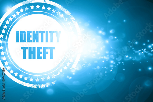 Blue stamp on a glittering background: Identity theft fraud back