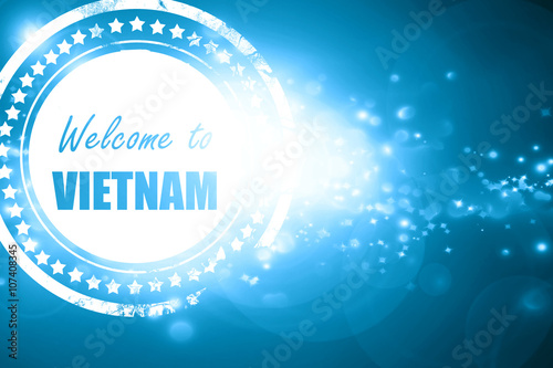 Blue stamp on a glittering background: Welcome to vietnam