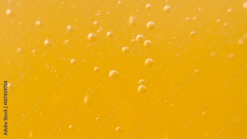 Fresh orange fruit in a glass of soda water Fresh orange fruit in a glass of soda water