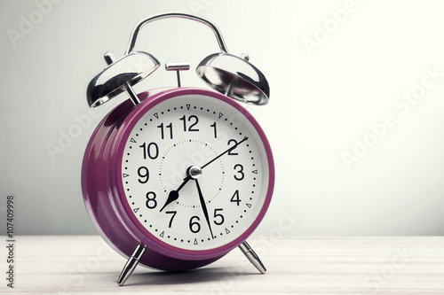 green alarm clock morning wake-up time