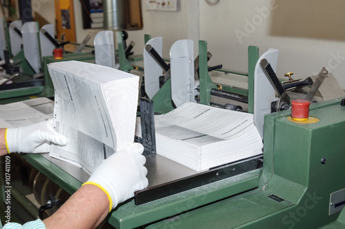 Binding of books in printing house