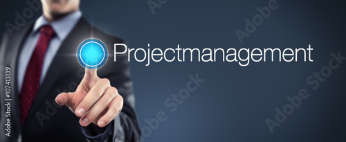 Man touching Button Projectmanagement