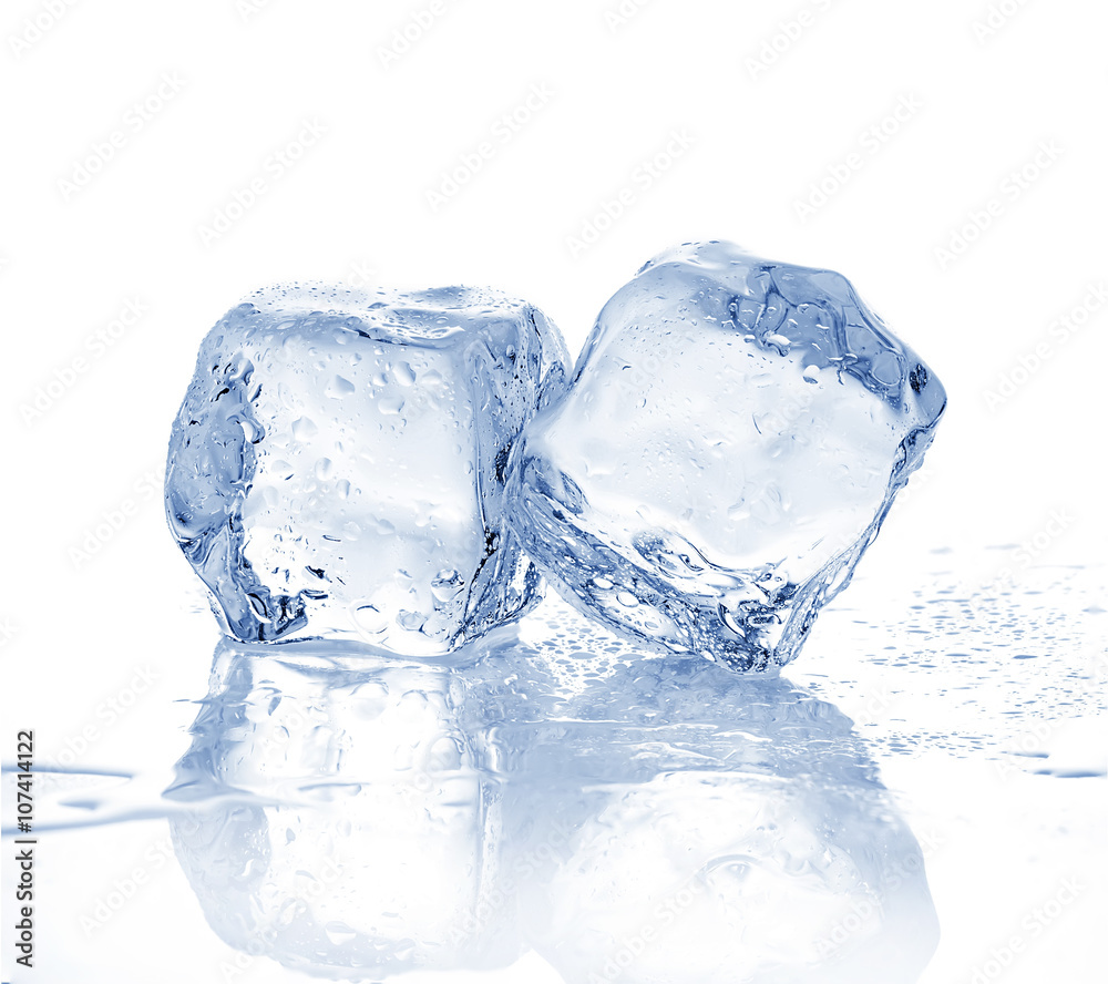 Two melting ice cubes on white background. Two melting ice cubes on white background.