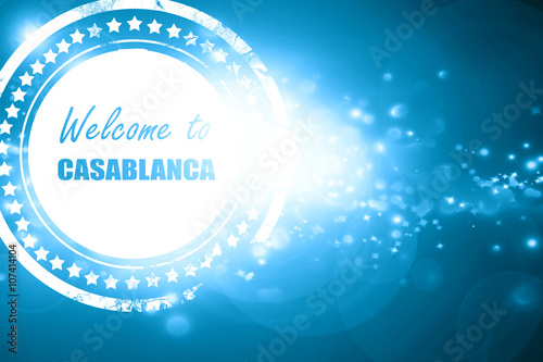 Blue stamp on a glittering background: Welcome to casblanca