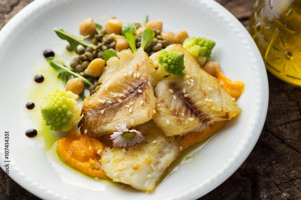 Fish fillet with chickpeas, carrot puree and vegetables Fish fillet with chickpeas, carrot puree and vegetables