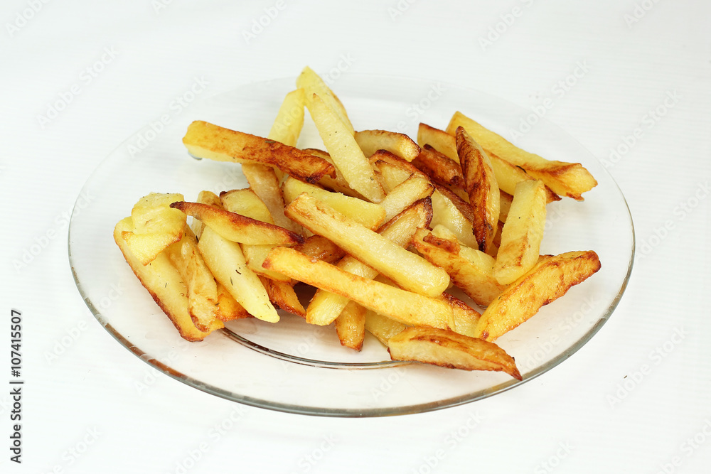 fried potatoes on a glass plate