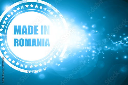 Blue stamp on a glittering background: Made in romania