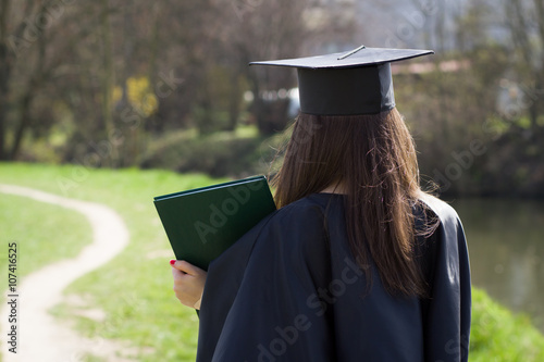 Pretty clever college / university student / girl after graduati photo