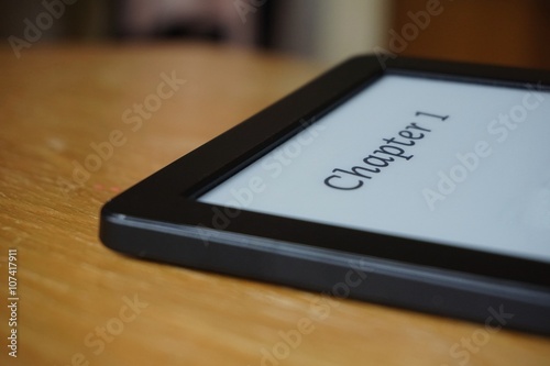 
Electronic reader with a caption Chapter 1 in electronic Ink on the display 