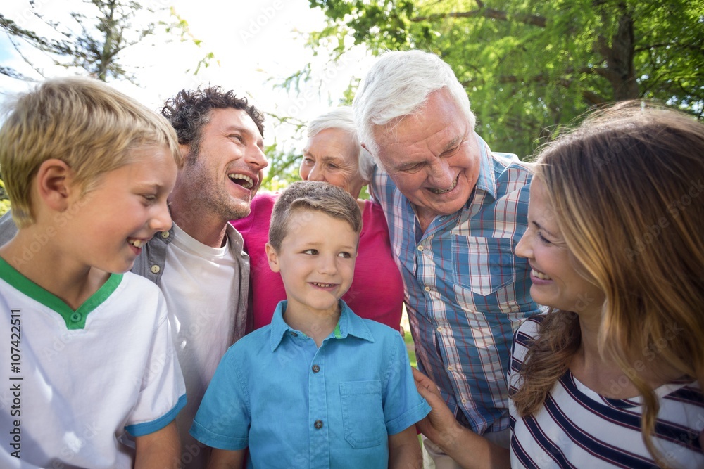 Smiling family standing and laughing Smiling family standing and laughing