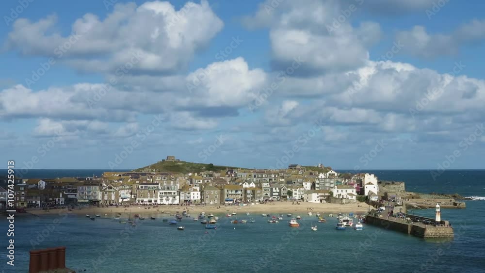 St. Ives harbour beach timelapse fast moving clouds, Cornwall England. St. Ives harbour beach timelapse fast moving clouds, Cornwall England.