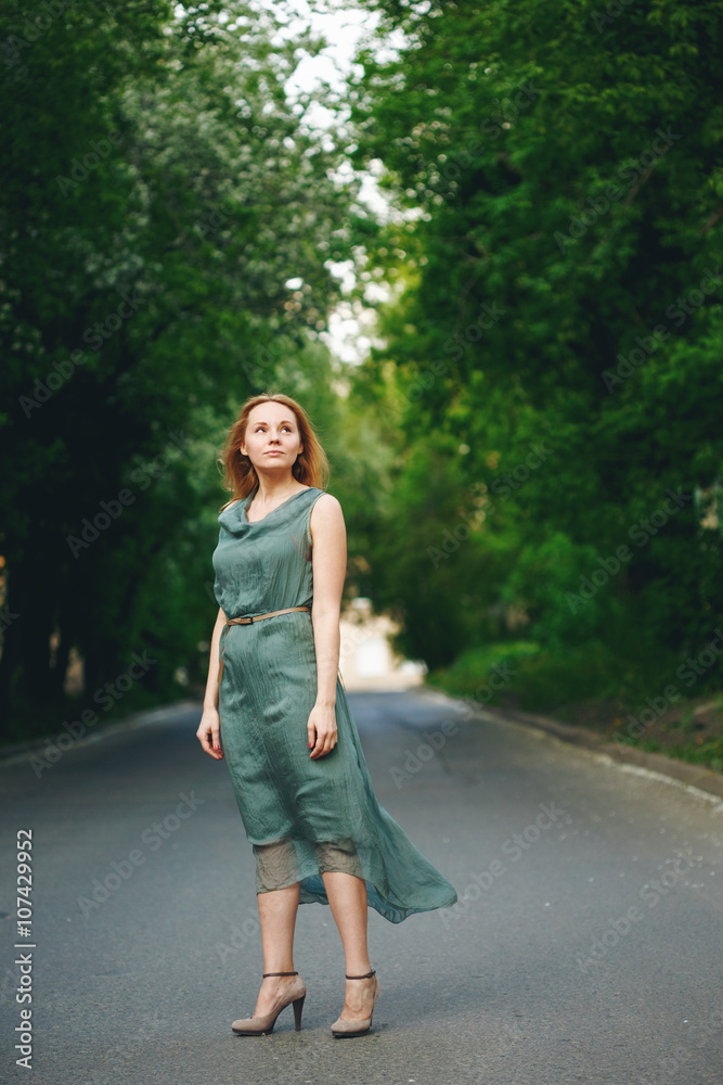 Young Woman Standing on the Road Young Woman Standing on the Road