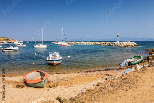 Boats in Bay of Nea Fokia village, Halkidiki, Greece.