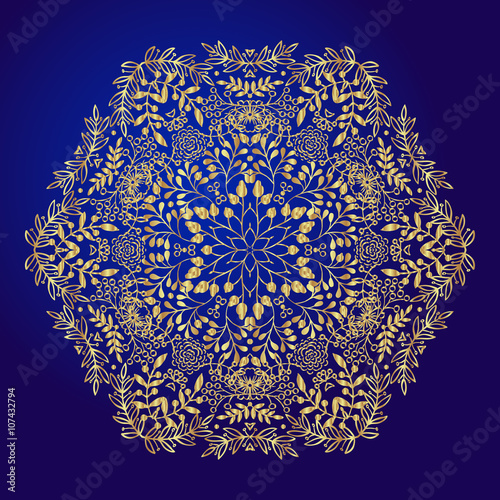 Mandala, amulet. Esoteric gold symbol on a blue background.
