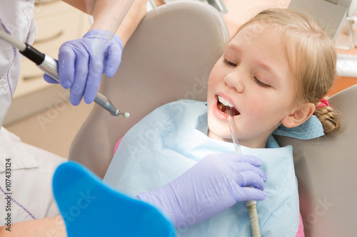 Young girl at dentist., dental treatment 