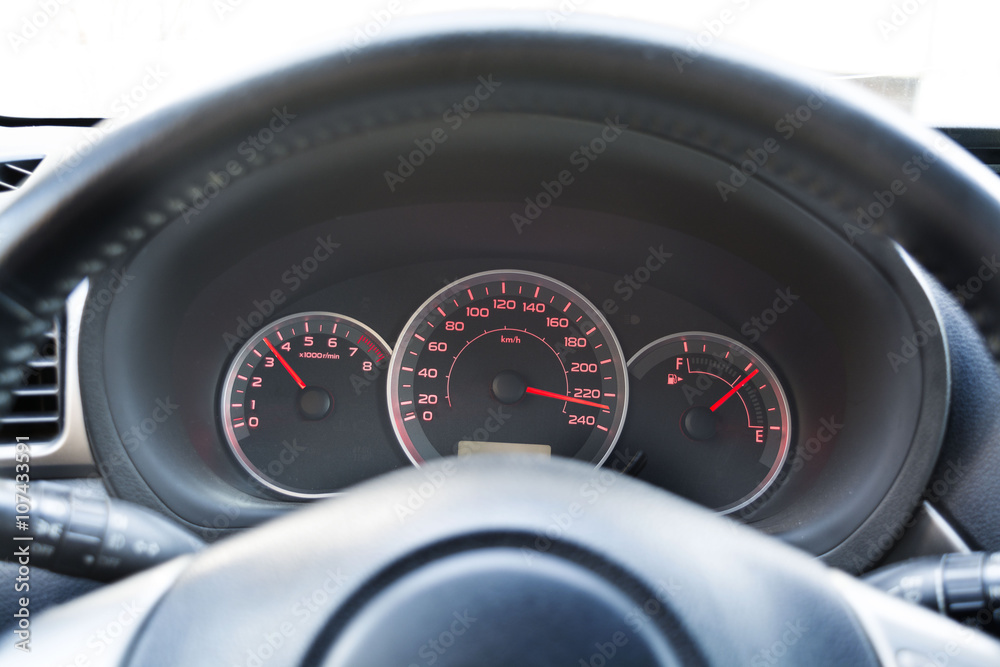 Speedometer of the car at high speed, close, selective focus Speedometer of the car at high speed, close, selective focus