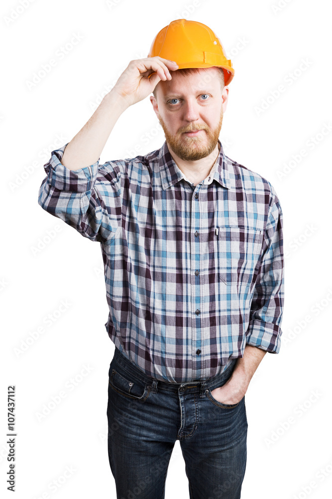Man puts on the orange protective helmet Man puts on the orange protective helmet