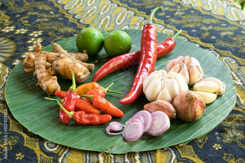 Balinese spices against the background of Batik photo