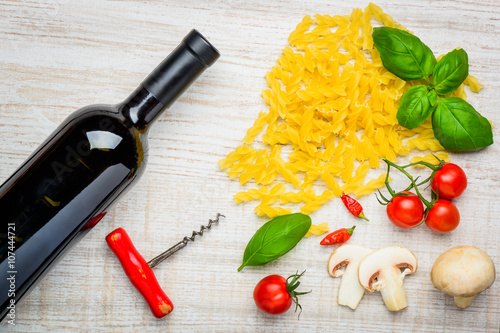 Iatalian Cuisine Fusilli Pasta and Red Wine photo