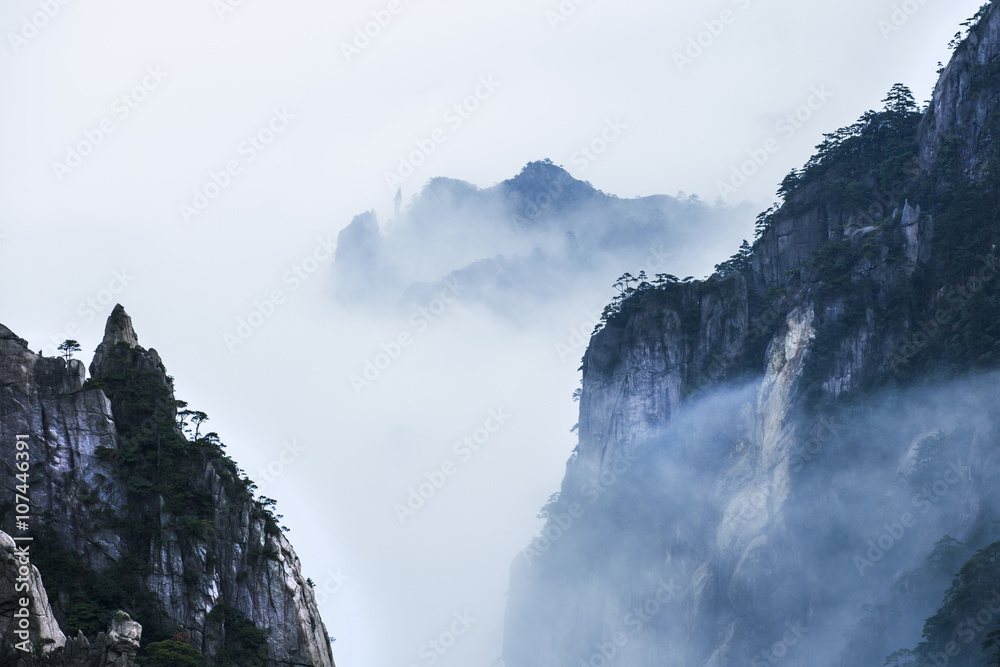 View of clouds over mountain peak View of clouds over mountain peak