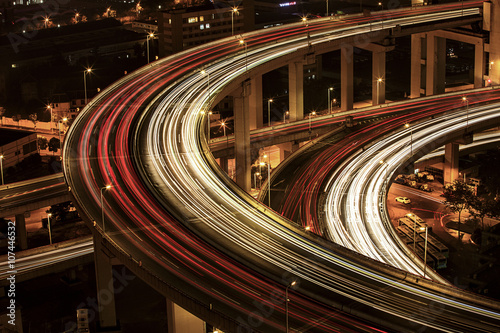 Long exposure of vehicles moving on elevated road photo
